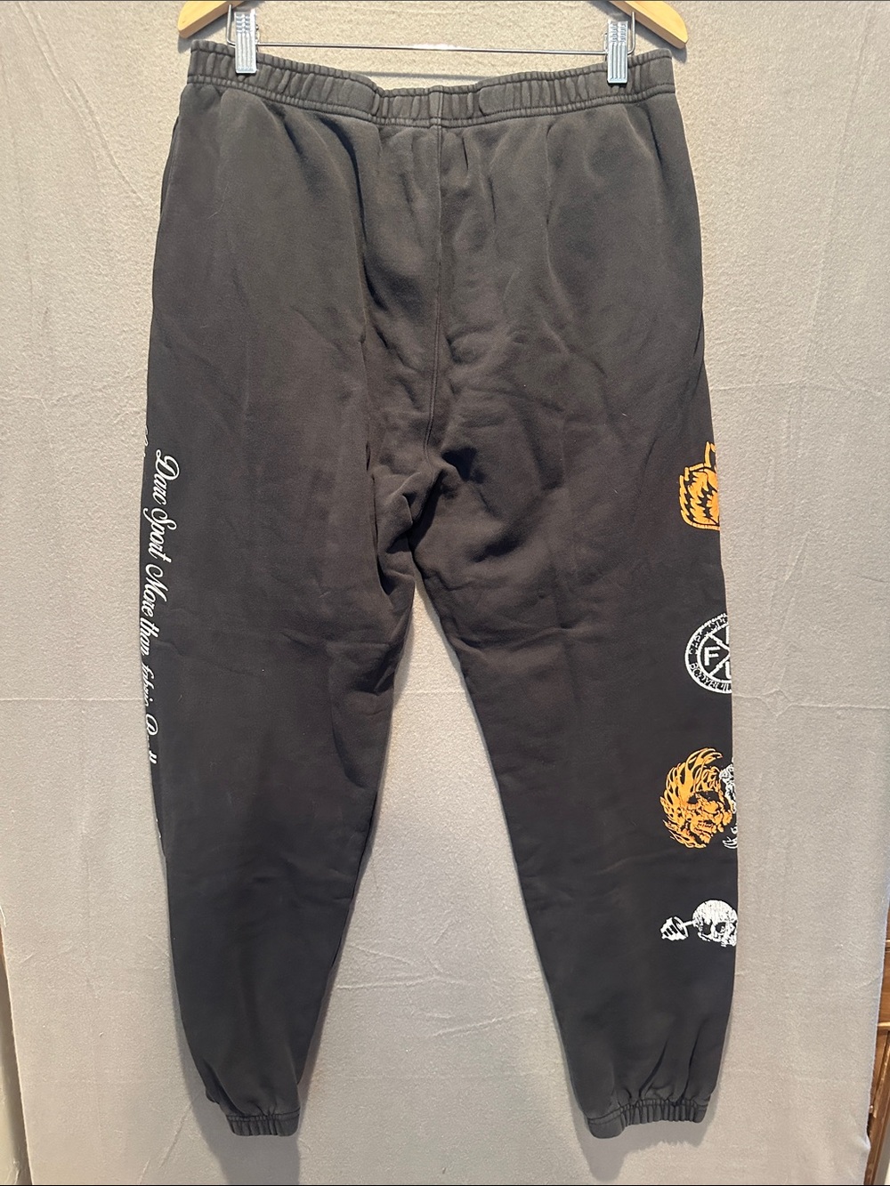 Darc Sport Black Joggers with White Script and Gold Graphic - Picture 3 of 6